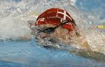 suveræn. Verdens hurtigste tid i 800 meter fri uden brud af superdragter leverede Lotte Friis til aften i Atlanta. 
