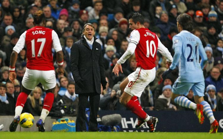 Tilfreds. Roberto Mancini øjner succes for City i denne sæson. 