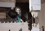 Kamp. Aisha Gaddafi har hyret en israelsk advokat til at undersøge omstændighederne omkring sin fars død. 