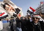 Pro-Assad. Demonstranter, der støtter præsident Bashar al-Assad, var i dag på gaden i hovedstaden Damaskus. 