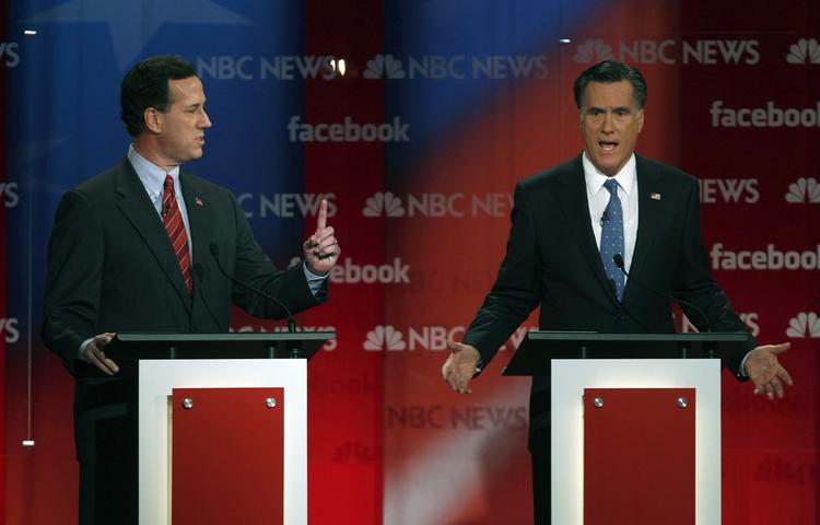 Forsvarsposition. Mitt Romney (t.h.) måtte forsvare sig mod angreb fra blandt andre Rick Santorum. 