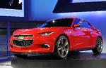 Den afrundede. Chevrolet Tru 140S Concept Coupe ser meget lav ud, men har plads til fire personer. Foto: Paul Sancya/AP 