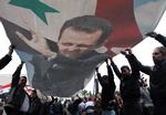 Pro-Assad. Tilhængere af præsident Bashar al-Assad demonstrerede onsdag i hovedstaden Damascus. 