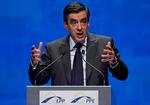 Handling. Frankrigs premierminister Francois Fillon lover, at landet vil justere sine budgetter i lyset af nedjusteringen fra S&amp;P. 