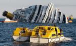 Ulykke. Her til morgen fortsatte redningsfolk med at lede efter overlevende ved 'Costa Concordia'. 