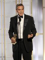 Sejrherre. George Clooney modtog sent søndag (amerikansk tid) i Los Angeles en Golden Globe-pris for bedste mandlige hovedrolle. 