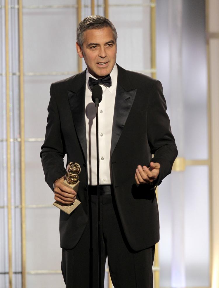 Sejrherre. George Clooney modtog sent søndag (amerikansk tid) i Los Angeles en Golden Globe-pris for bedste mandlige hovedrolle. 
