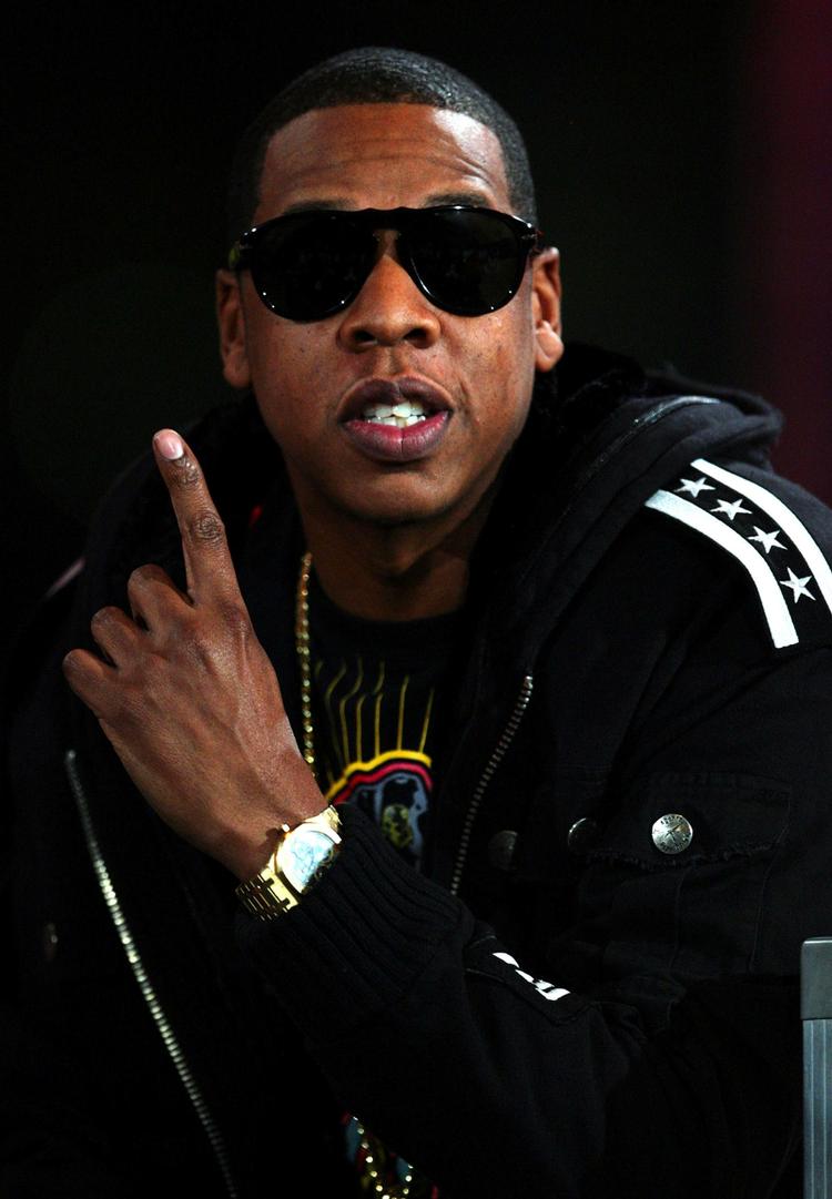Obama-fan. Da senator Barack Obama i 2008 stillede op til præsidentvalget i USA, fik han støtte fra blandt andre rapperen Jay-Z (billedet), der turnerede med budskabet »det er tid til forandring, det er tid til Barack Obama«. 