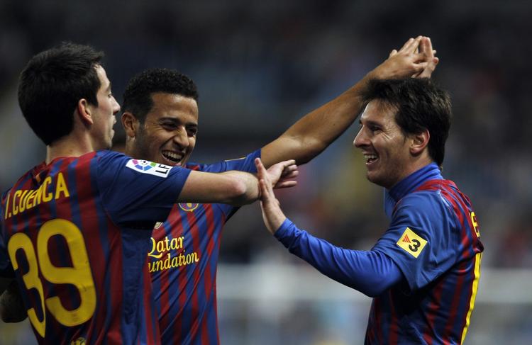 Hattrick. Messi (t.h.) stjal igen billedet, da Barca vandt endnu en stor sejr. 