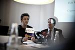 Economy Minister Margrethe Vestager receives the OECD's Economic Survey on Denmark from the OECD's Robert Ford. 