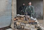 OPRØR. Oprørere fotograferet i Homs. På grund af situationen i landet er det vanskeligt at få billeder af det igangværende oprør mod regimet ud af Syrien. 