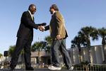 Opbakning. Den tidligere republikanske kandidat Herman Cain og Ronald Reagans søn, Michael Reagan, tager del i Newt Gingrich kampagne i Florida. 
