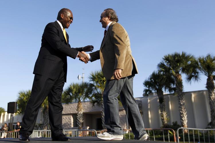Opbakning. Den tidligere republikanske kandidat Herman Cain og Ronald Reagans søn, Michael Reagan, tager del i Newt Gingrich kampagne i Florida. 