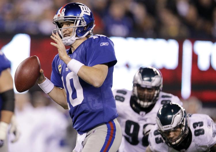 Fænomenalt. Eli Manning førte sit hold til sejr og en plads i slutspillet, hvor Atlanta venter i den kommende weekend. Det er første gang siden 2008 Giants er med i slutspillet, der kulminerer med Super Bowl XLVI i Indianapolis 5. februar. 