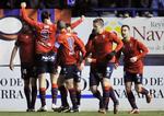 Glæde. Osasuna-spillerne jubler over sejren mod Barcelona. 