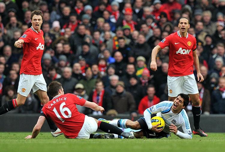 Nedtur. Rio Ferdinand (t.h.) er storebror til Anton Ferdinand, som er spilleren, der er involveret i en anden racismesag, hvor den fyrede engelske landsholdsanfører John Terry er hovedperson. 