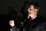 Medvind. Rick Santorum har længe lignet en 'underdog' i republikanernes primærvalg. Men to målinger giver ham grund til optimisme inden afstemning i Michigan. 