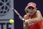 ude. Efter sidste års finaleplads blev det kun en enkelt kamp i Doha i år for Caroline Wozniacki. 