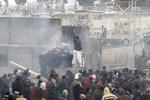 vrede. Over 2.000 demonstranter samledes foran Bagram-basen for at protestere mod koran-afbrændingen. 