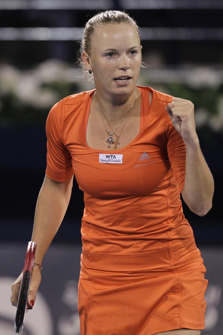 Jubel. Wozniacki knyttede næven i 2. sæt, hvor den rumænske kvalifikationsspiller vågnede kortvarigt op og forlængede danskerens arbejdsdag med nogle minutter. 