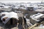 LEJR. Flygtning fra Helmandprovinsen i lejr af spinkle rønner i Kabul. Amnesty kritiserer den afghanske regerings behandling af sine interne flygtninge. 