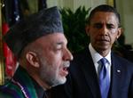 BEKLAGELSE. USA's præsident Barack Obama giver sin afghanske kollega Hamid Karzai (i forgrunden) en lodret undskyldning for amerikanske soldaters afbrænding af Koranen. 