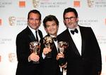 Hæder. Jean Dujardin, Thomas Langmann og  Michel Hazanavicius med deres priser for 'The Artist' ved den nylige Bafta-uddeling i London. 