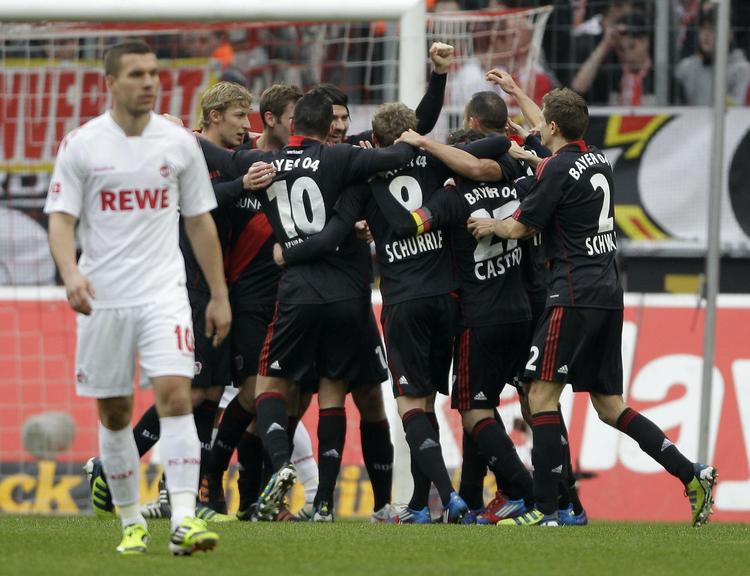 comeback. Selv med Lukas Podolski (tv.) tilbage efter en skade tabte FC Köln til Bayer Leverkusen. 