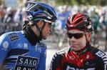 sekunda. Mens Alberto Contador (tv.) er udelukket, holdt en anden Tour de France-vinder, Cadel Evans (th.) sig ude af topkampen i dagens løb. 