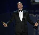 Glæde. »Wow, putain, génial. Merci beaucoup«, råbte Jean Dujardin fra scenen ved Oscar-showet. 