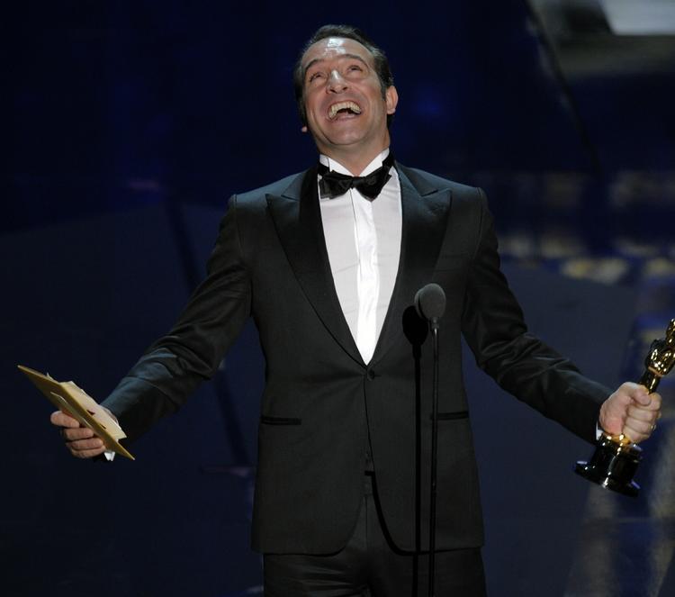Glæde. »Wow, putain, génial. Merci beaucoup«, råbte Jean Dujardin fra scenen ved Oscar-showet. 