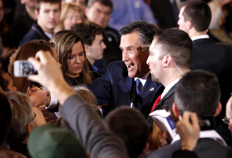 Michigan. Mitt Romney nyder sejren blandt sine støtter i staten, hvor han er født. 