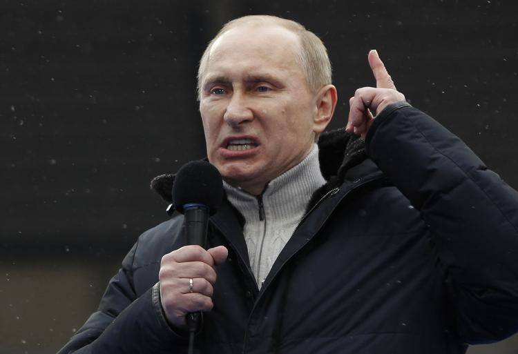 FAVORIT. Ifølge meningsmålingerne står Vladimir Putin til at få 60 procent af stemmerne ved det kommende præsidentvalg. 