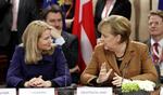 Pagt. Helle Thorning-Schmidt drøfter situationen med den tyske kansler Angela Merkel. 