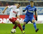 REDNINGSMAND. Et mål af Lukas Podolski (tv.) sikrede FC Köln uafgjort. 