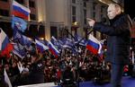 VALG. Ruslands nuværende ministerpræsident Vladimir Putin har erklæret sig som vinder af præsidentvalget. Men valget kritiseres for udbredt snyd. 