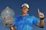 dobbelt. Både trofæ og en førsteplads fik Rory McIlroy for sin sejr i Honda Classic. 