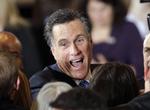 Ohio-vinder. Mitt Romney vandt supertirsdags vigtigste delstat, Ohio. Resultatet var så tæt, at sejren først var hjemme, da næsten 100 procent var talt op. Her fejrer han sin sejr i hjemstaten Massachusetts sammen med fans i Boston. Foto: AP/Stephan Savoia 