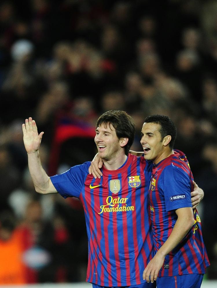 enestående. Lionel Messi fejrer en af sine fem scoringer mod Bayer Leverkusen sammen med holdkammeraten Pedro (th). 