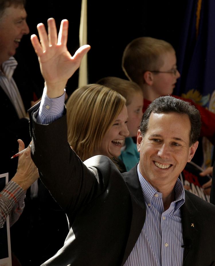 Vinder. Rick Santorum står til over halvdelen af stemmerne i dagens valg i Kansas. Her er han på kampagnetur i byen Topeka i går. Foto: Charlie Riedel/AP 