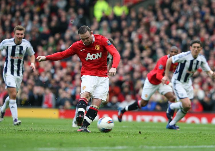 2-0. Med et straffespark afgjorde Wayne Rooney definitivt Manchester Uniteds sejr over West Bromwich. 