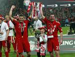 Titel. Liverpool og Gerrard (t.v.)vandt for et par uger siden den første titel i seks år, da de kæmpede sig til sejr i Liga Cup-finalen mod Cardiff. 