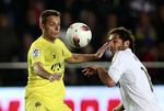 Deling. Real Madrid og Alvaro Arbeloa (t.h.) satte for anden kamp i træk point til. 