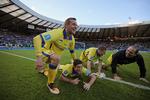 Glæde. De gulklædte Kilmarnock-spillere kunne juble efter sejren over Celtic i ligacuppen. 