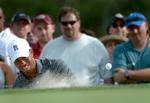 tørke. Tiger Woods klarer sig fri af en bunker på 14. hul under Arnold Palmer Invitational -turneringen i Orlando. 