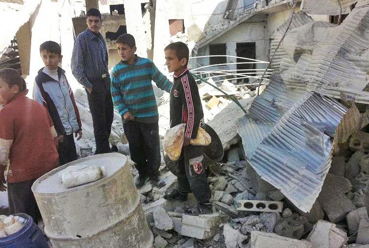 Borgerkrig. Ifølge oprørerne stammer dette billede fra oprørsbyen Idlib, som har været udsat for hårde bombardementer. 