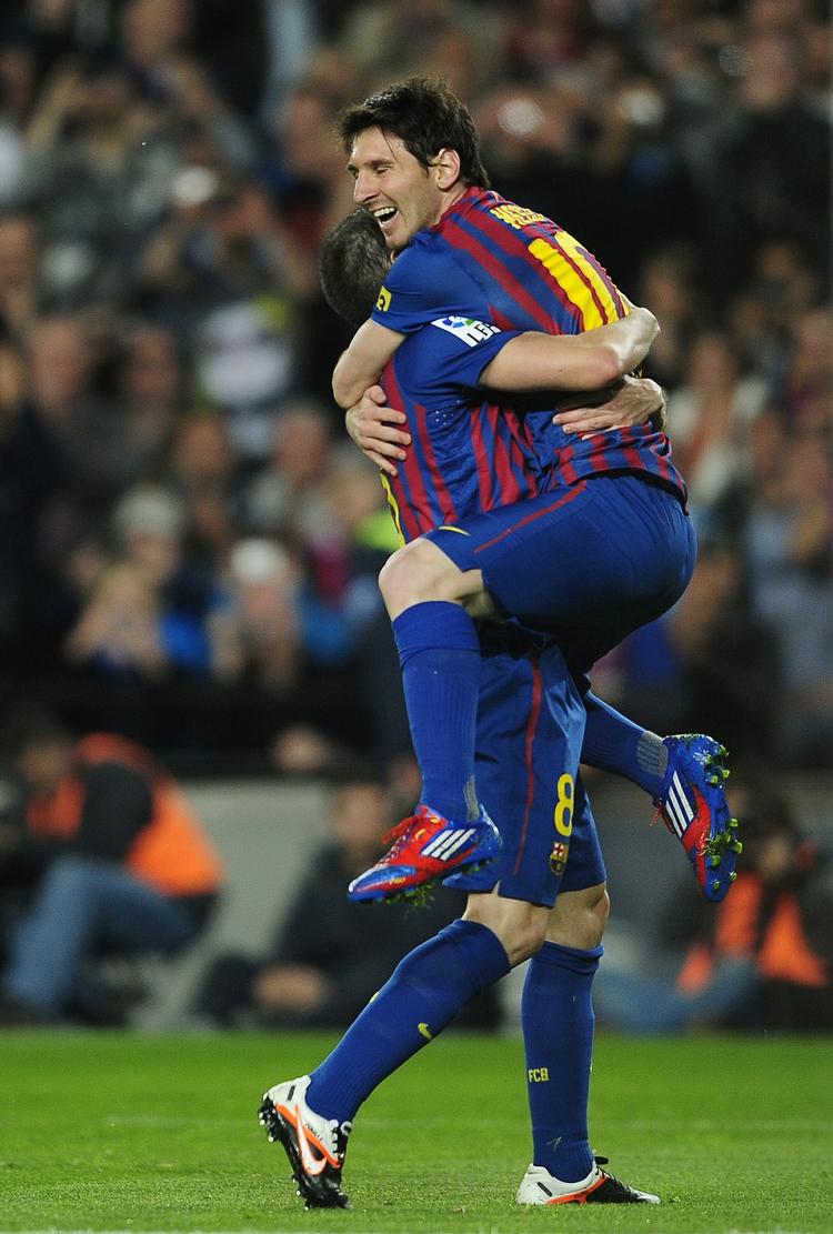 Sejr. Andrés Iniesta og Lionel Messi scorede målene for de forsvarende mestre, da holdet vandt for ottende gang i træk i La Liga. 