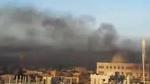 Angreb. Billedet er fra en video, der angiveligt viser røg fra bombardementet af byen Aleppo i det nordlige Syrien. 