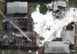 Styrt. Alle beboerne overlevede i boligblokken i Virginia Beach, hvor et jagerfly fra den amerikanske flåde styrtede ned i aftes. 