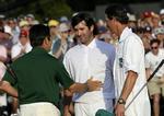 OMSPIL. På både 18. hul og i det første omspilshul puttede Bubba Watson (i midten) for sejren, men det lykkedes først i tredje omgang. 